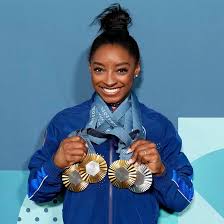 Simone Biles Withdraws from Tokyo — and Wins a Different Kind of Gold